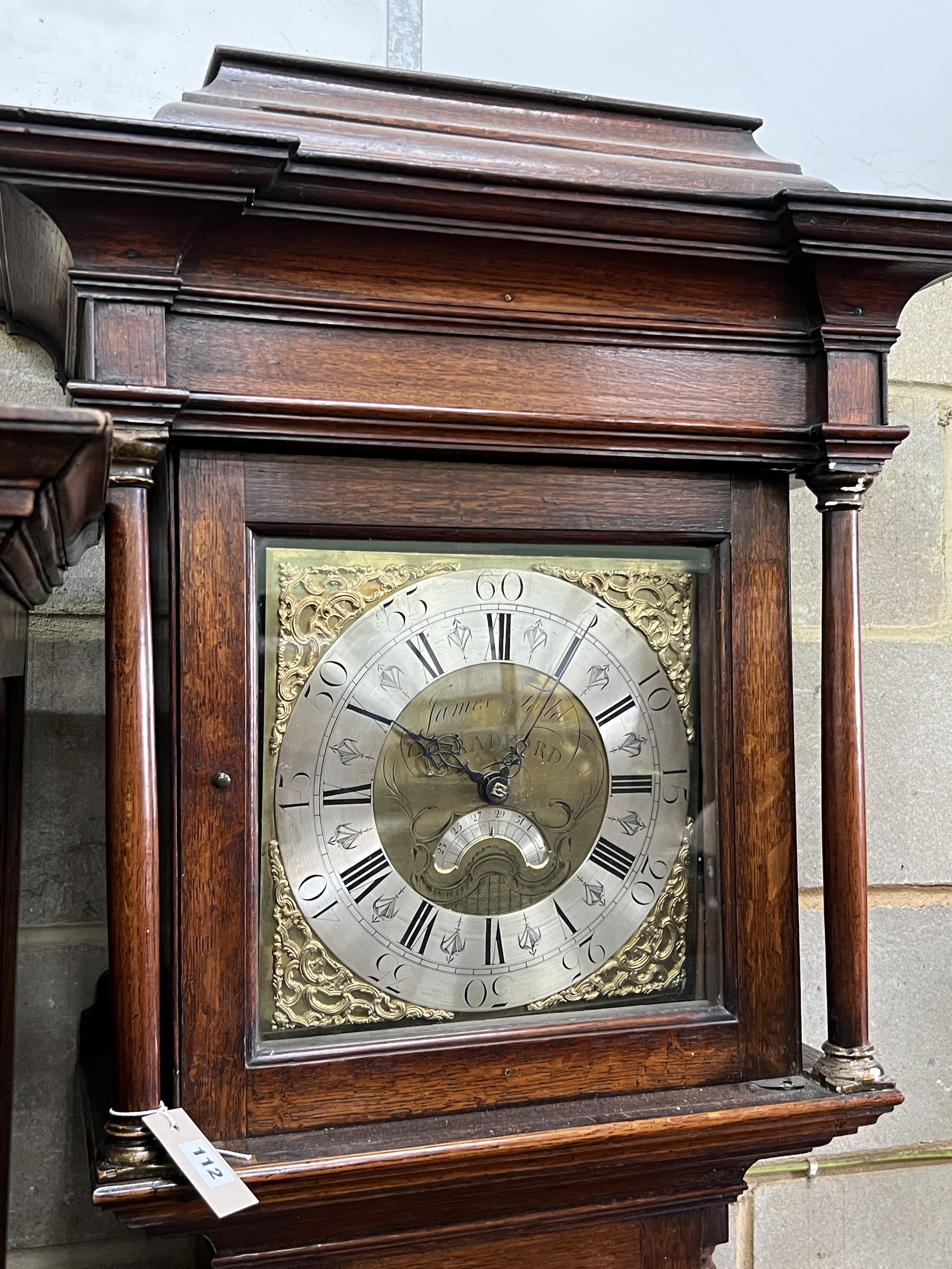 A George III inlaid oak thirty hour longcase clock, marked James Todd, Bradford, height 220cm